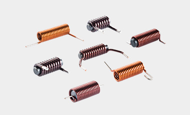 [Translate to Spanish:] Your specialist for enameled copper coils up to 3.5 mm – also with a ferrite core.